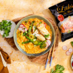 Singapore Laksa noedels met kabeljauw en groene asperges-image